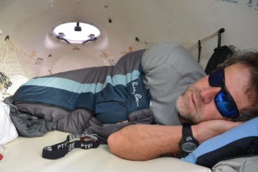 Huw sleeping in the cabin of Mr Hops