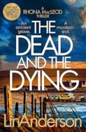 Image of a book cover featuring a coastal landscape at sunset. In the foreground, weathered wooden posts stand in a line along the beach, casting long shadows. Farther back, two emergency vehicles with bright blue and yellow checker patterns are parked near the water’s edge. Large white uppercase text in the centre of the image reads “THE DEAD AND THE DYING.” Above it, smaller text reads “A RHONA MacLEOD THRILLER,” alongside the phrases “An ancient grave.” and “A modern evil.” At the bottom, the author’s name “Lin Anderson” appears in bold gold text.